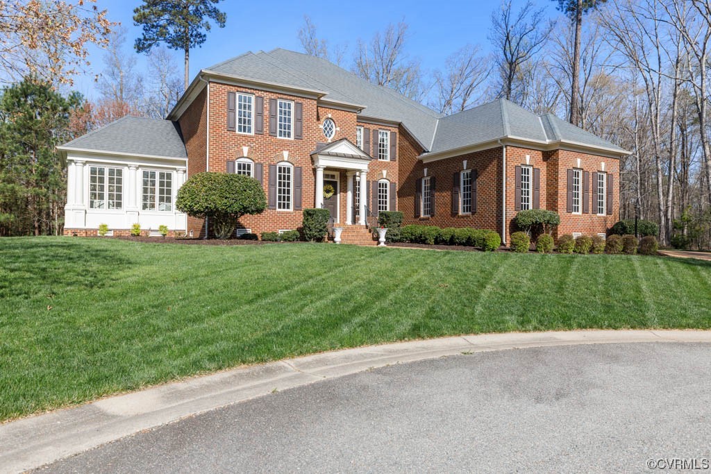 4318 Elmstone Road Midlothian, VA 23113 - Photo 3 of 47 a front view of a house with a yard