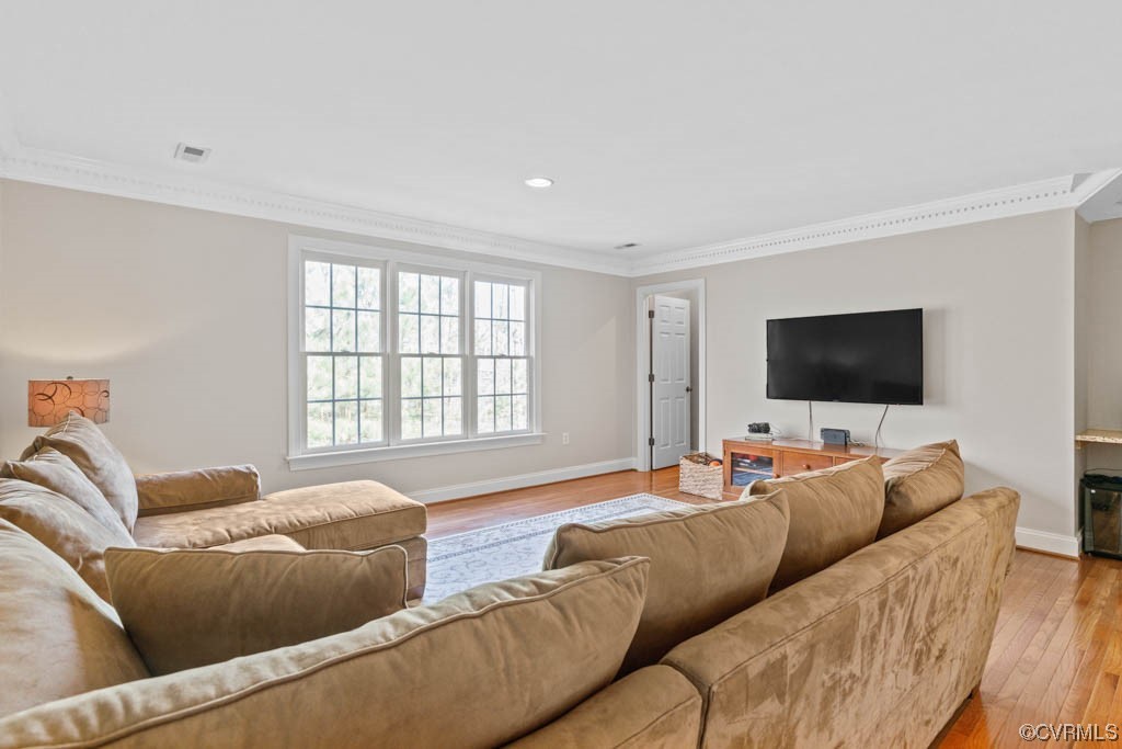 4318 Elmstone Road Midlothian, VA 23113 - Photo 34 of 47 a living room with furniture and a flat screen tv