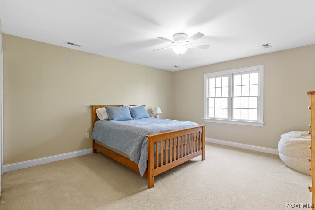 4318 Elmstone Road Midlothian, VA 23113 - Photo 36 of 47 a spacious bedroom with a bed and window