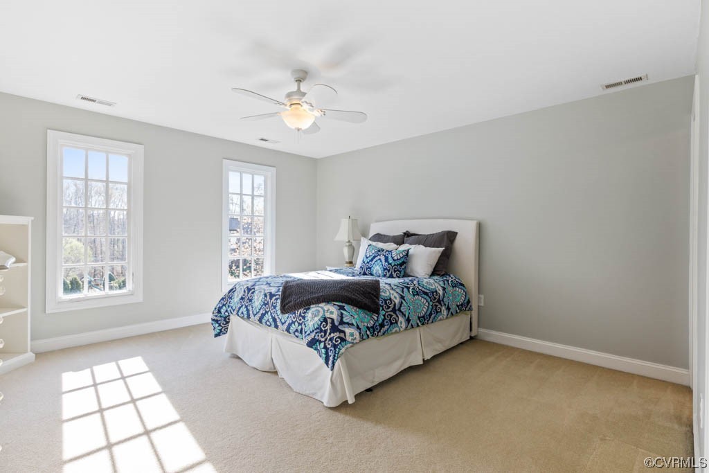 4318 Elmstone Road Midlothian, VA 23113 - Photo 38 of 47 a bed sitting in a bedroom next to a window