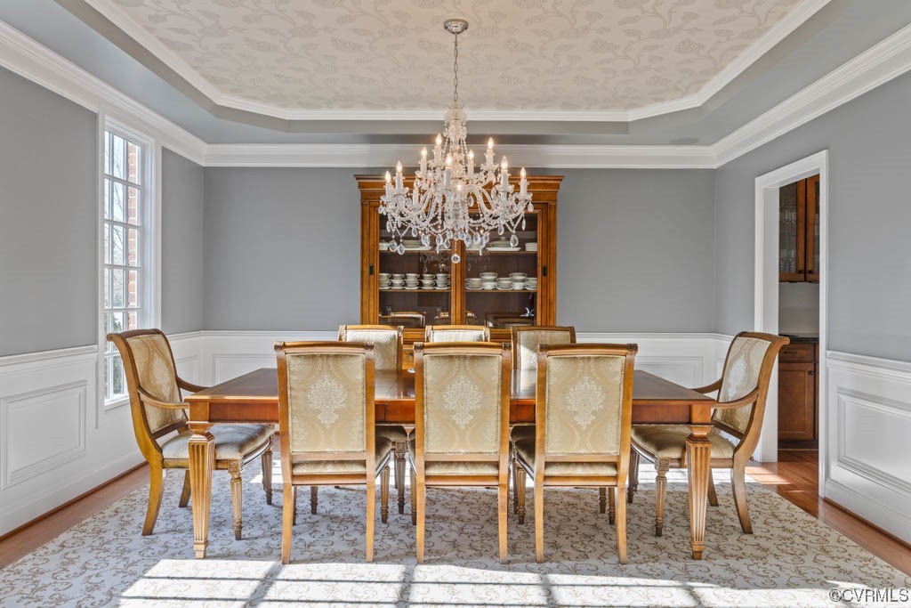 4318 Elmstone Road Midlothian, VA 23113 - Photo 7 of 47 a view of a dining room with furniture and chandelier