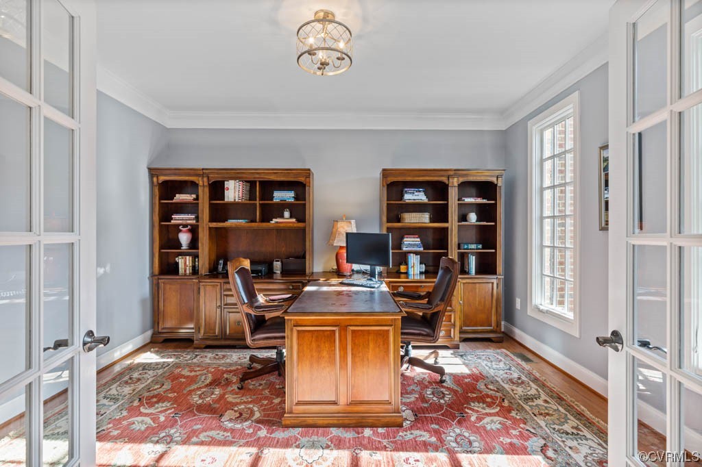 4318 Elmstone Road Midlothian, VA 23113 - Photo 8 of 47 a room with lots of books and a table