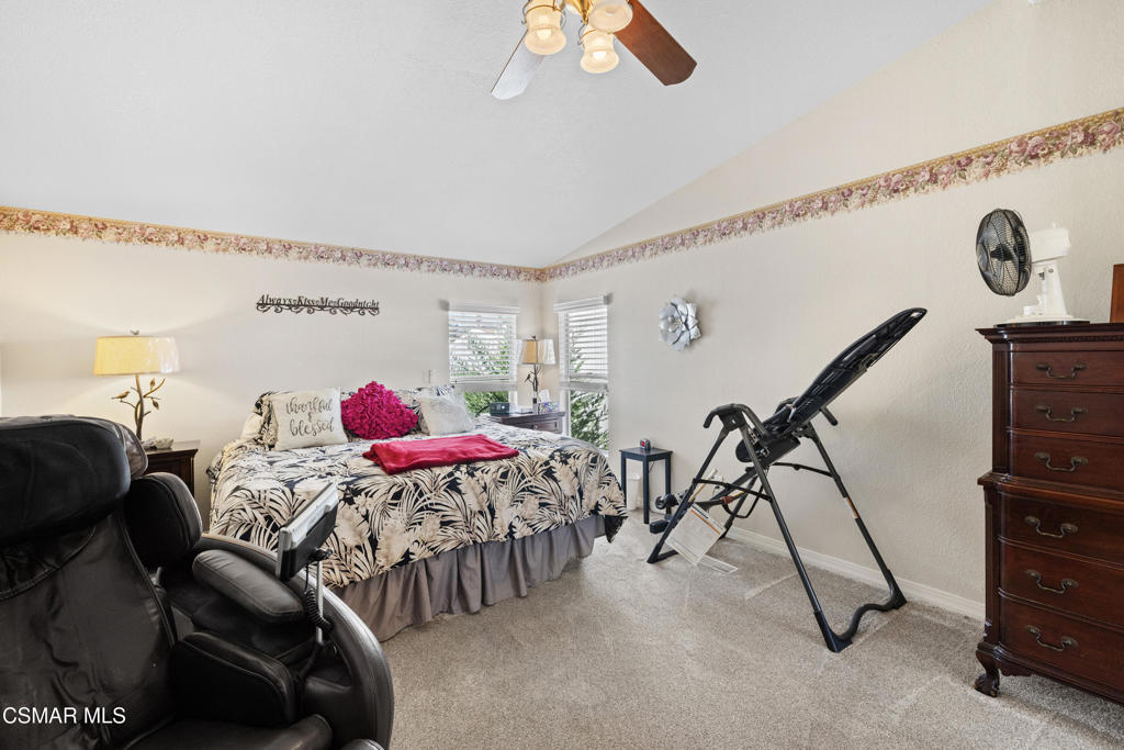 195 Tierra Rejada Road, Unit 52 Simi Valley, CA 93065 - Photo 14 of 34 a view of a dining room with furniture and a rug
