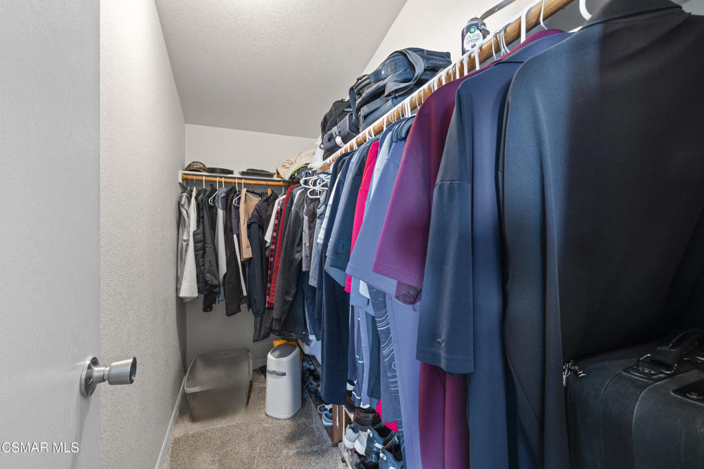 195 Tierra Rejada Road, Unit 52 Simi Valley, CA 93065 - Photo 17 of 34 a view of walk in closet with clothes