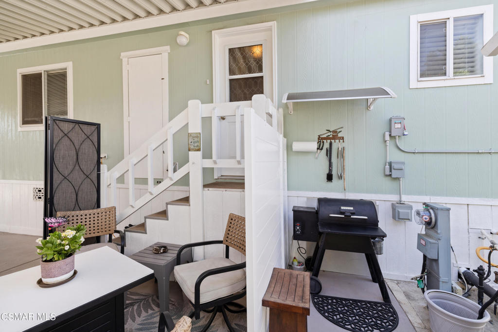 195 Tierra Rejada Road, Unit 52 Simi Valley, CA 93065 - Photo 23 of 34 a view of a livingroom with furniture and wooden floor