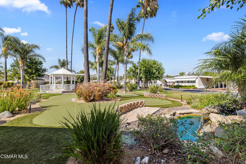 195 Tierra Rejada Road, Unit 52 Simi Valley, CA 93065 - Photo 26 of 34 a view of a swimming pool with a yard