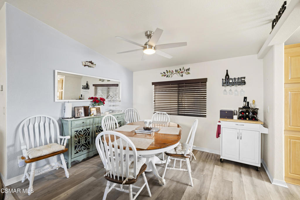 195 Tierra Rejada Road, Unit 52 Simi Valley, CA 93065 - Photo 8 of 34 a dining room with furniture and window