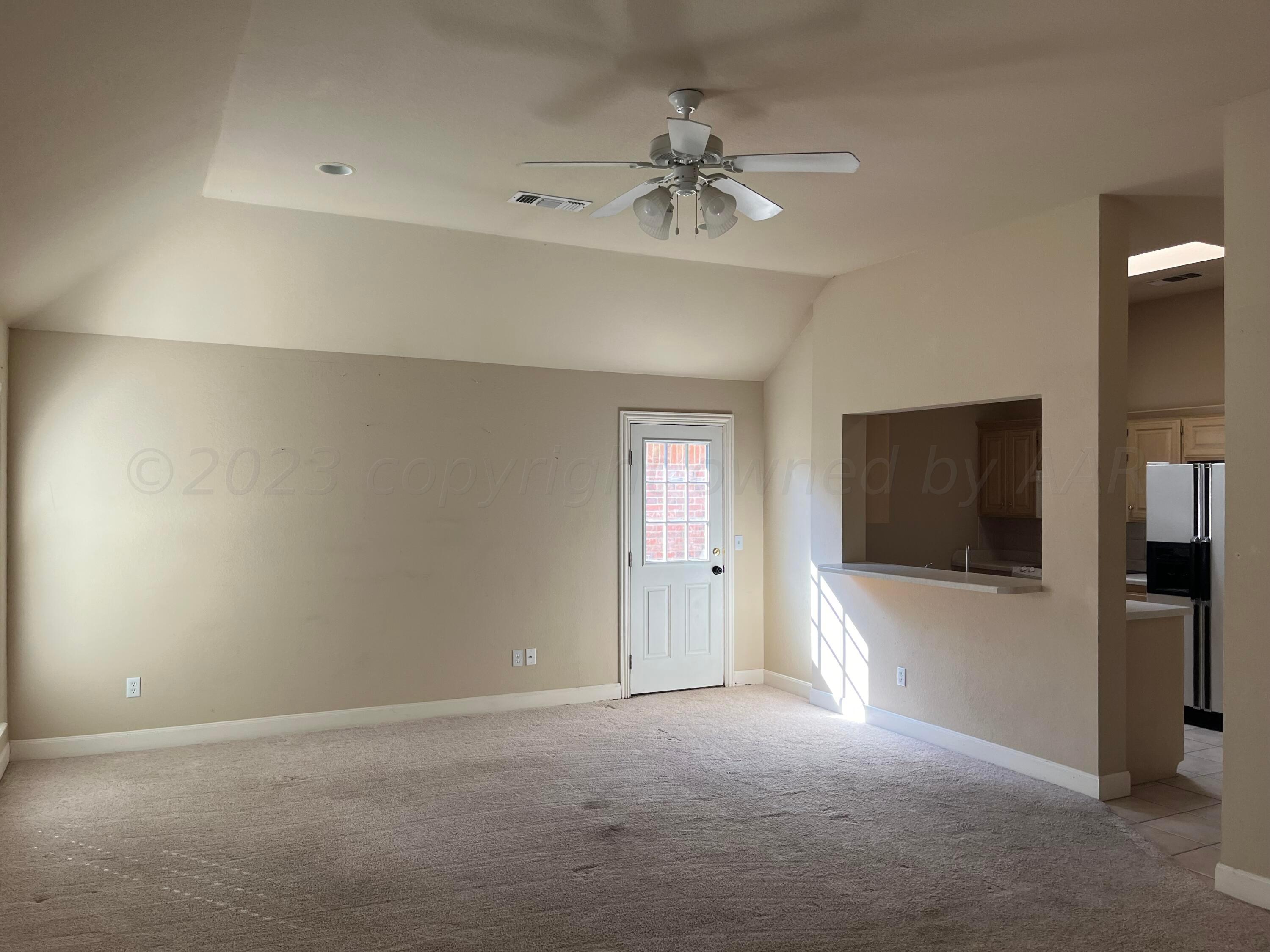 2 Windtree Amarillo, TX 79121 - Photo 2 of 15 a view of a livingroom with a flat screen tv