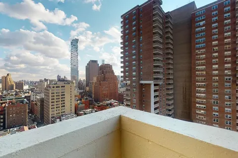 a view of a city with tall buildings