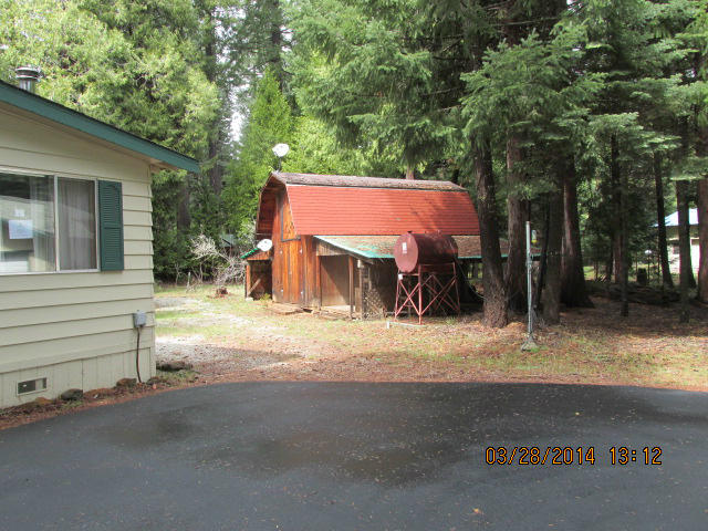 9264 Thatcher Road Shingletown, CA 96088 - Photo 13 of 13 a view of a house with a street