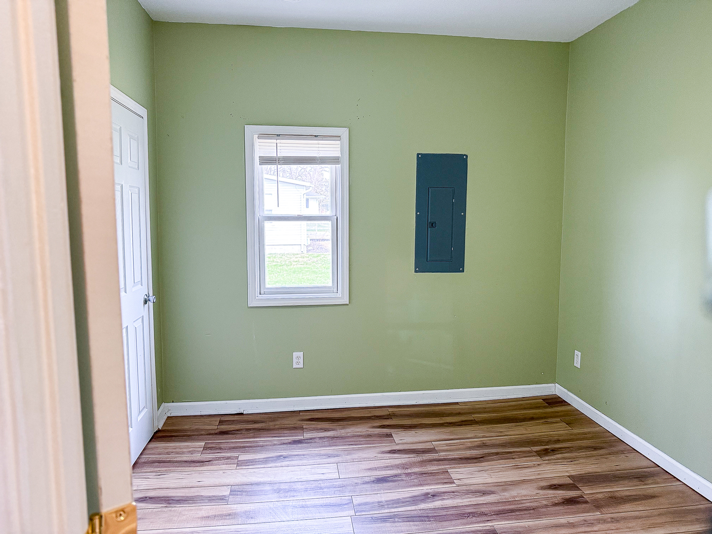 319 Missouri Street Atwood, IL 61913 - Photo 4 of 22 a view of a room with wooden floor and entryway