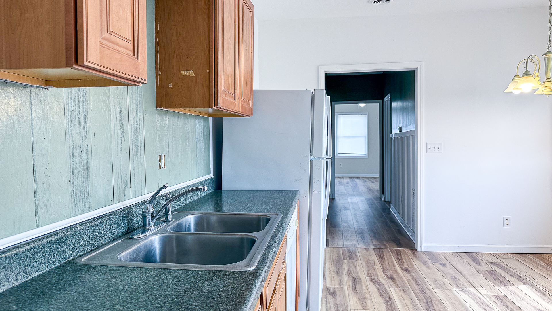 319 Missouri Street Atwood, IL 61913 - Photo 7 of 22 a kitchen with a sink and a window