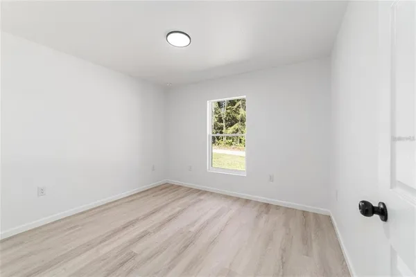 an empty room with a window