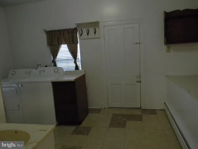 a room with cabinets and window