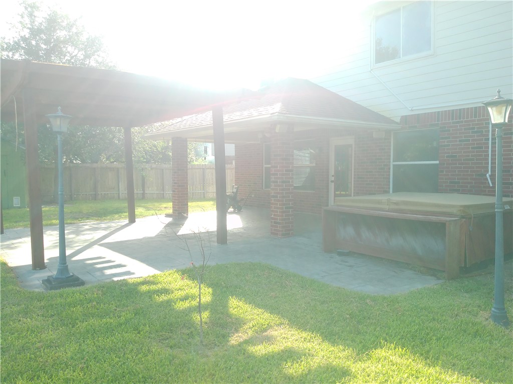 5405 Knights Circle Corpus Christi, TX 78413 - Photo 16 of 18 a bathroom with a bathtub and shower