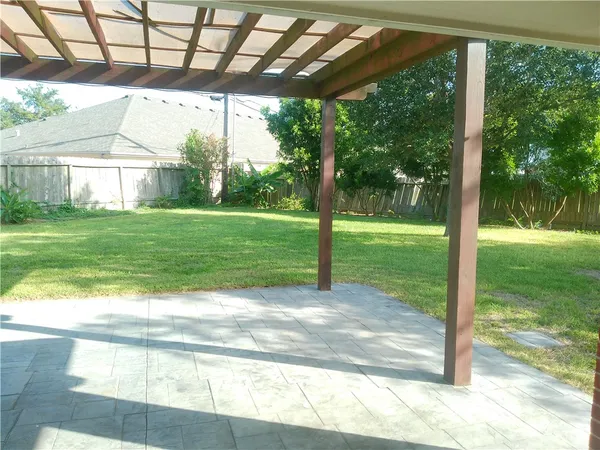 a view of a porch with a backyard