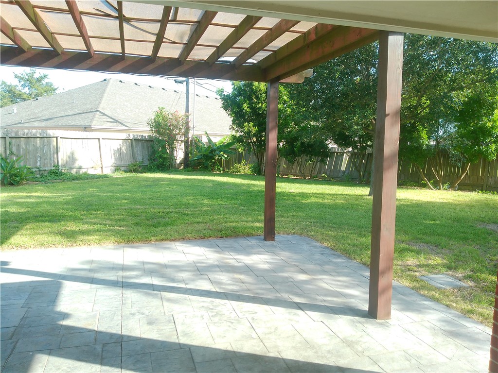 5405 Knights Circle Corpus Christi, TX 78413 - Photo 17 of 18 a view of a porch with a backyard
