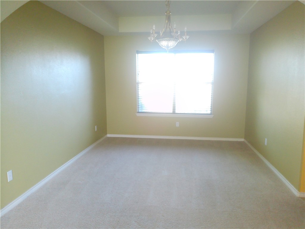5405 Knights Circle Corpus Christi, TX 78413 - Photo 3 of 18 an empty room with a window