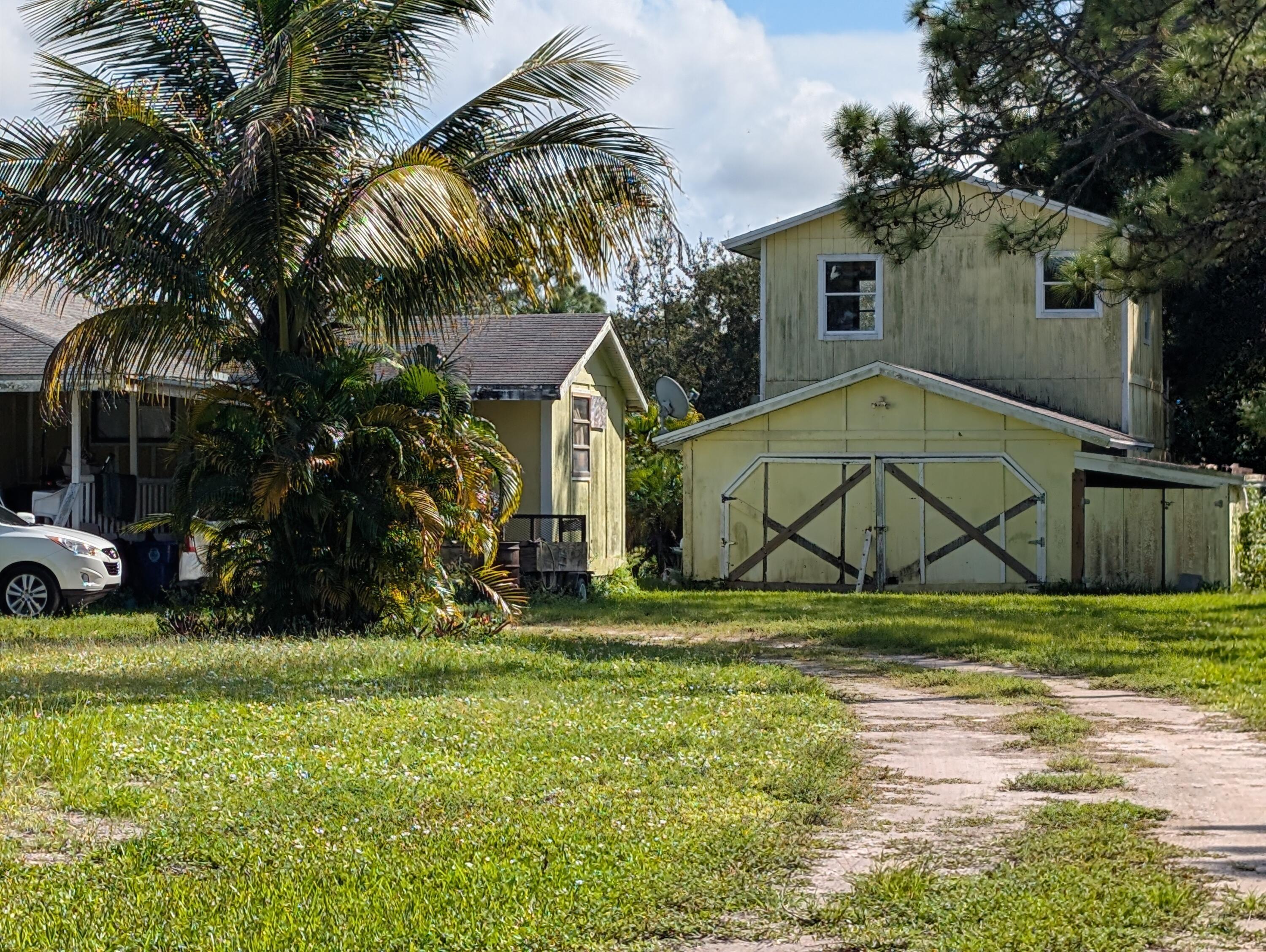 1500 Southeast Cove Road Stuart, FL 34997 - Photo 18 of 24 a view of outdoor space yard and deck