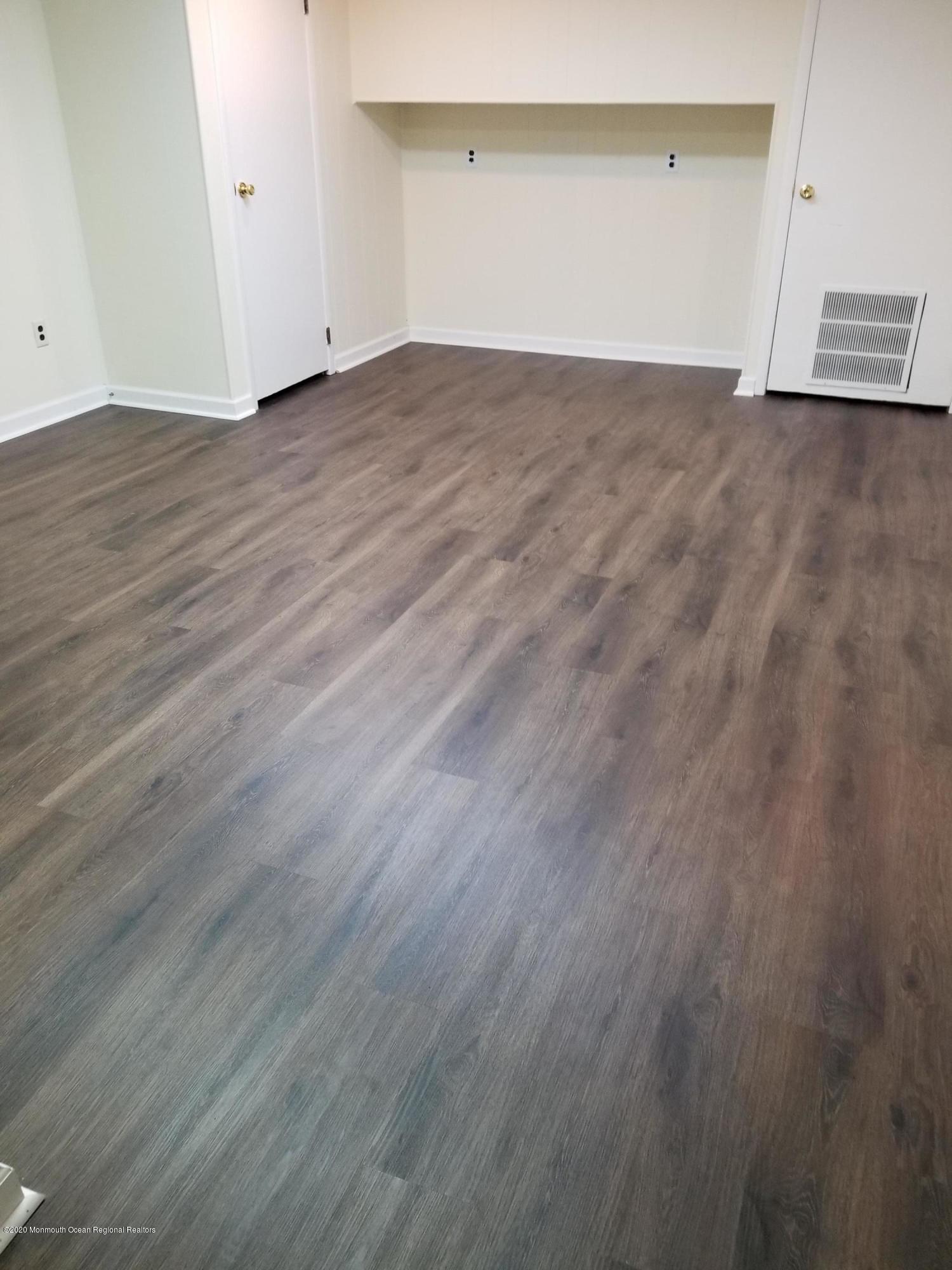 415 Middlewood Road Middletown, NJ 07748 - Photo 12 of 13 415 FR in basement new flooring