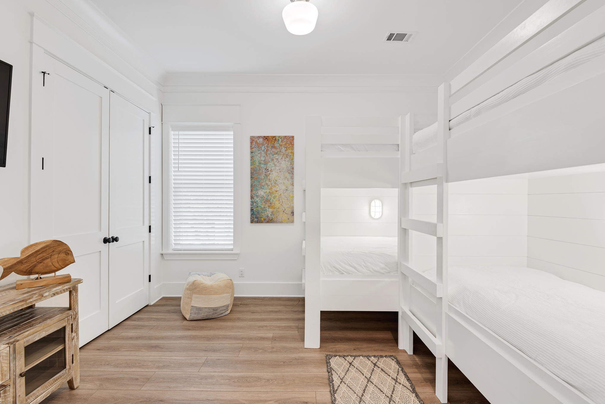 8427 East County Highway Seacrest, FL 32461 - Photo 18 of 74 a bathroom with a sink and a mirror