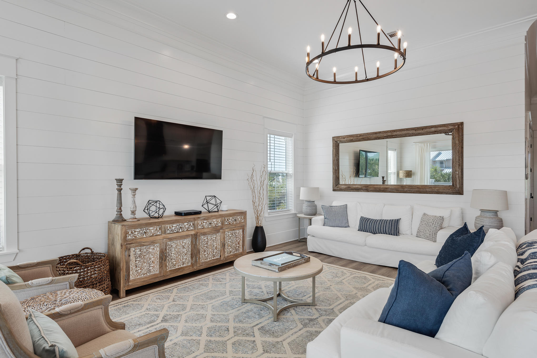 8427 East County Highway Seacrest, FL 32461 - Photo 34 of 74 a living room with furniture and a flat screen tv