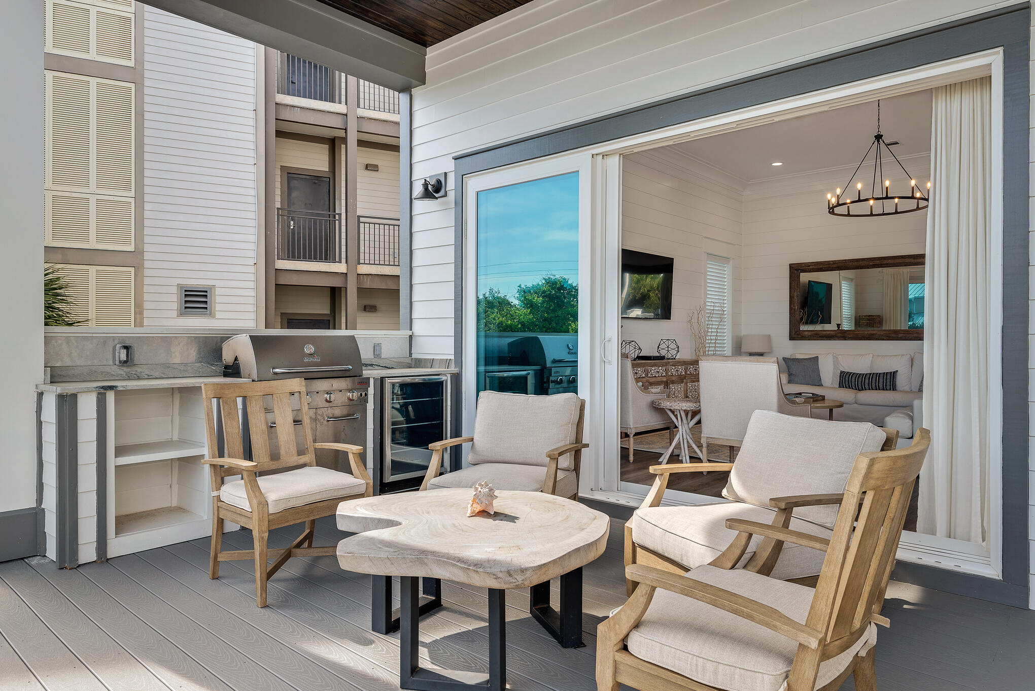8427 East County Highway Seacrest, FL 32461 - Photo 41 of 74 a view of a livingroom with furniture and a floor to ceiling window