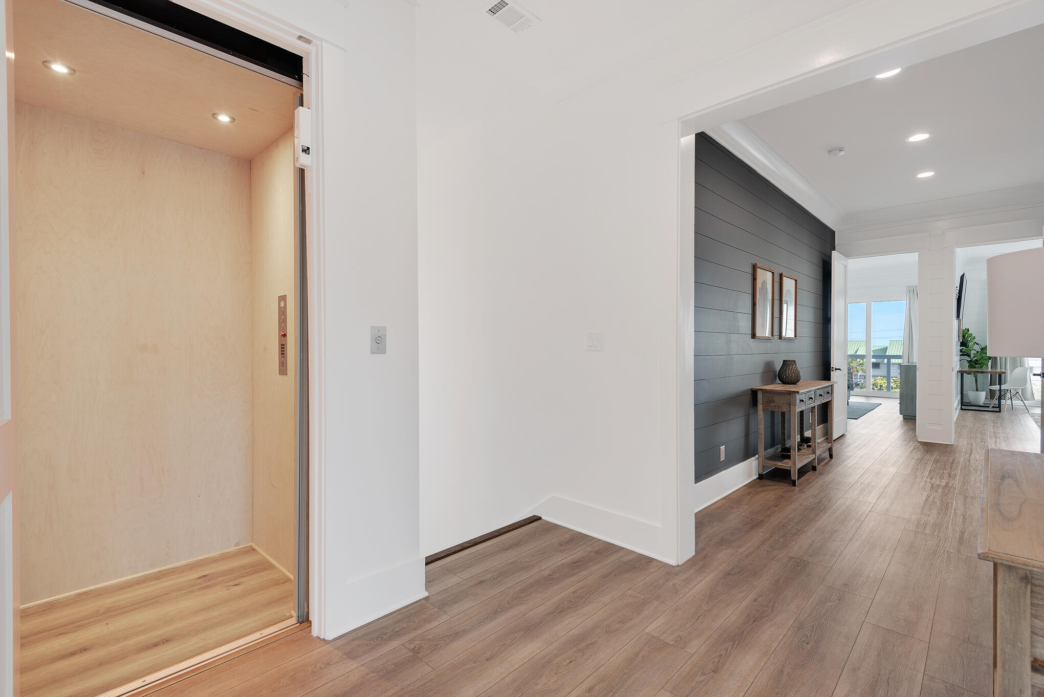 8427 East County Highway Seacrest, FL 32461 - Photo 50 of 74 a view of a living room and a wooden floor