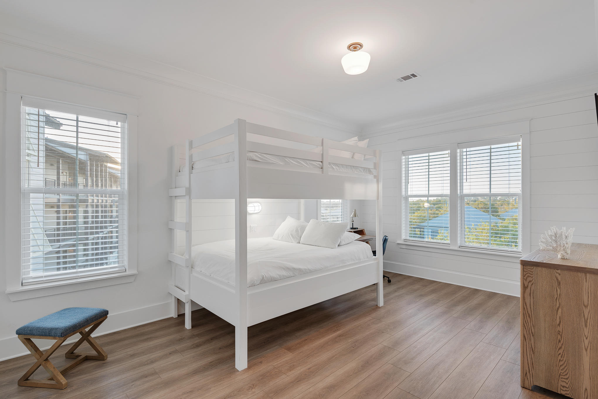 8427 East County Highway Seacrest, FL 32461 - Photo 51 of 74 a bedroom with a bed and a large window