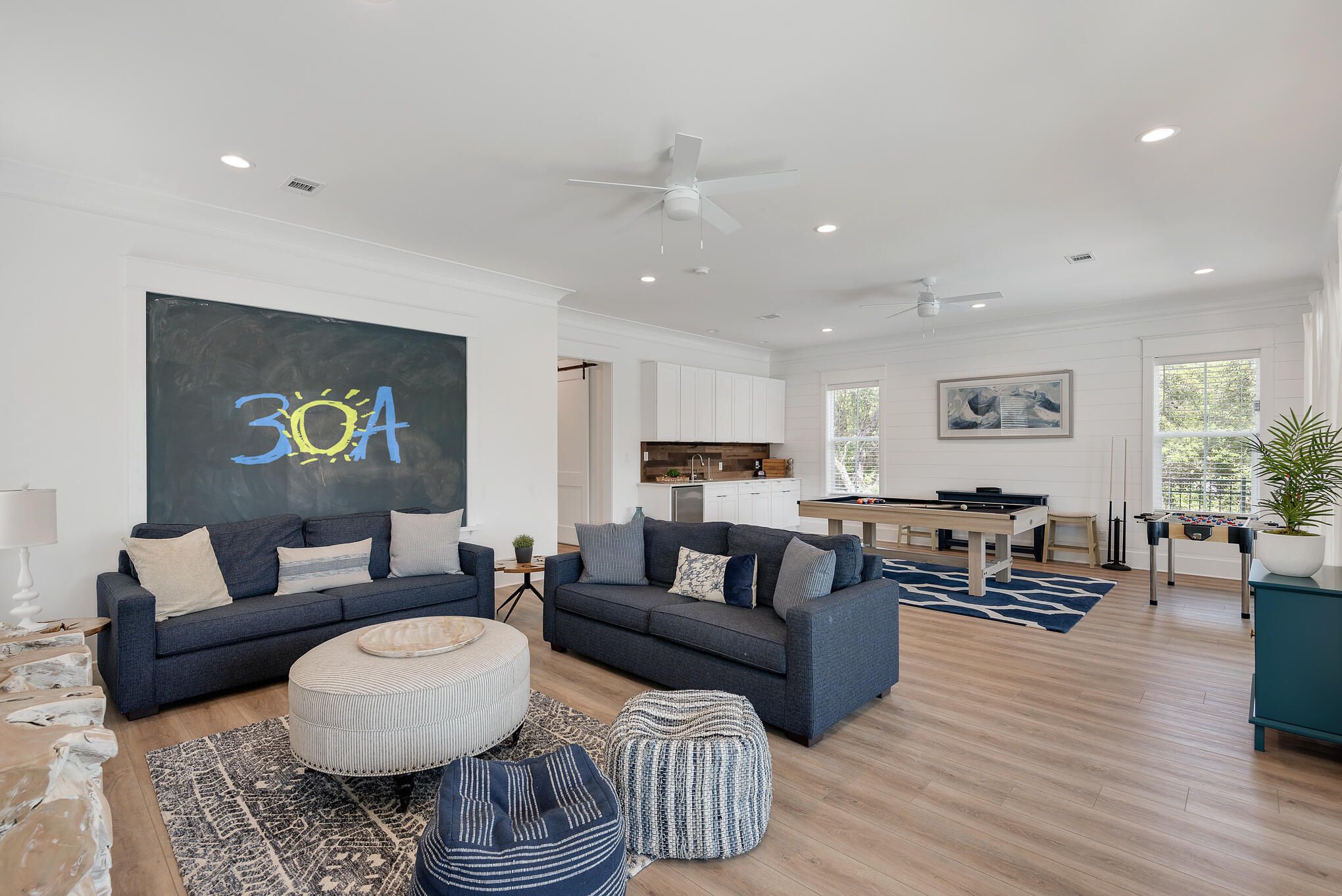 8427 East County Highway Seacrest, FL 32461 - Photo 6 of 74 a living room with furniture and wooden floor