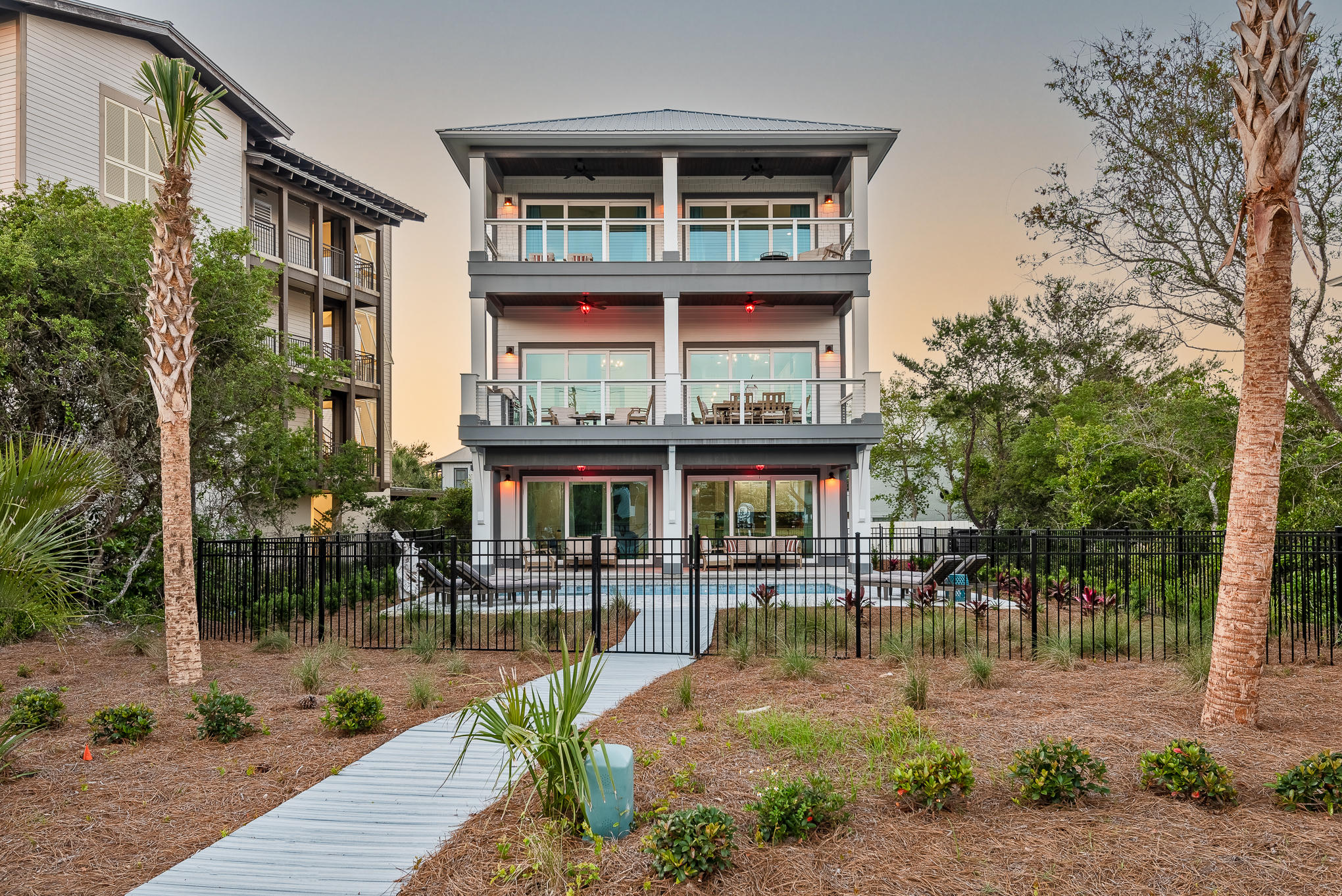 8427 East County Highway Seacrest, FL 32461 - Photo 67 of 74 a front view of a building with street view