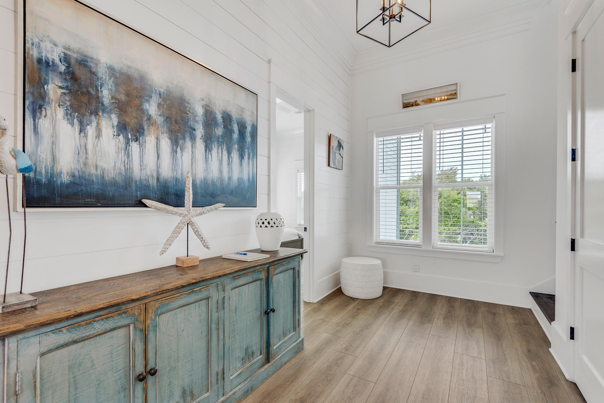 8427 East County Highway Seacrest, FL 32461 - Photo 9 of 74 a kitchen with a sink and wooden floor