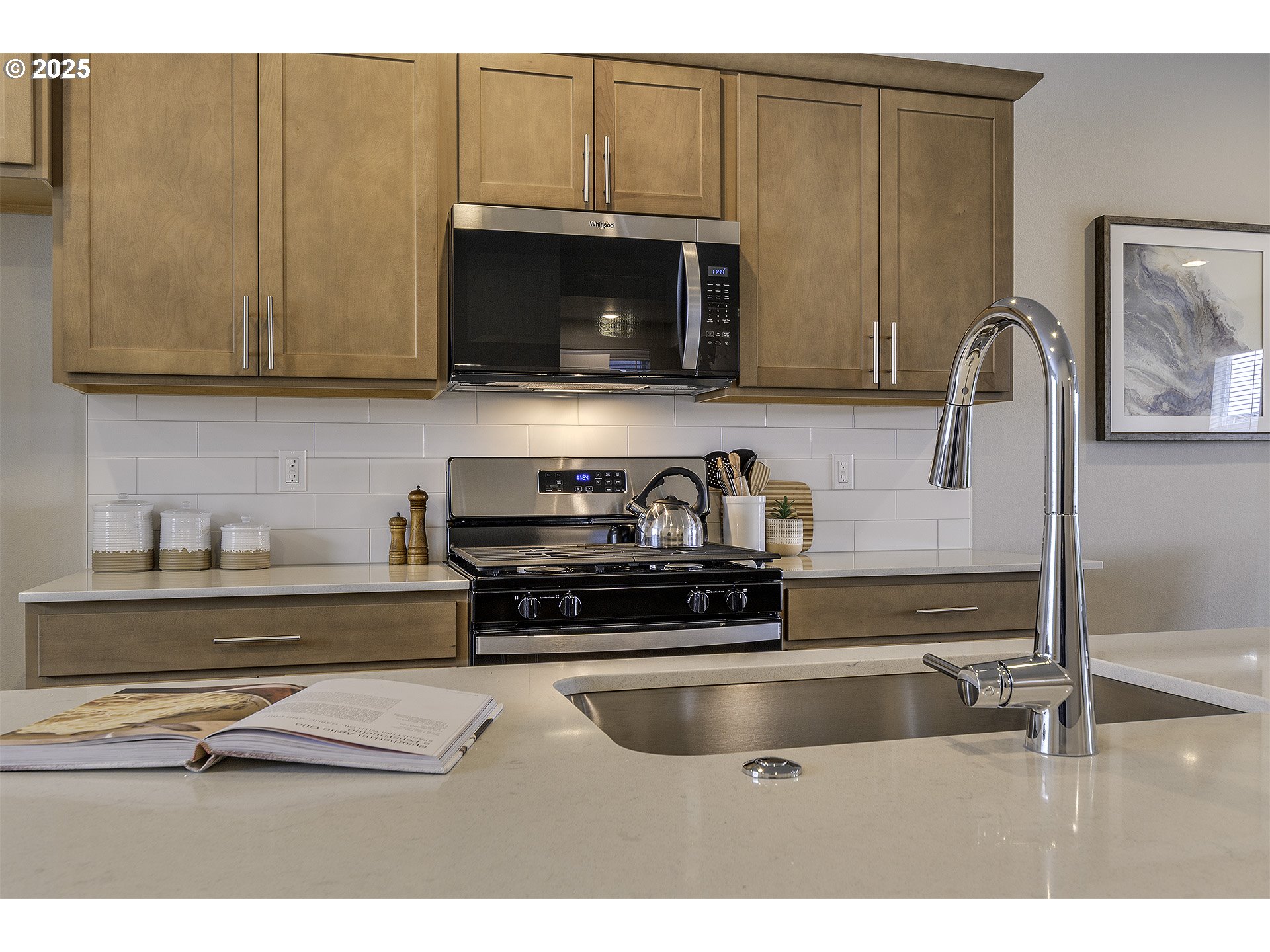 2129 Colby Lane, Unit 75 Forest Grove, OR 97116 - Photo 18 of 33 a kitchen with stainless steel appliances a stove a sink and a microwave