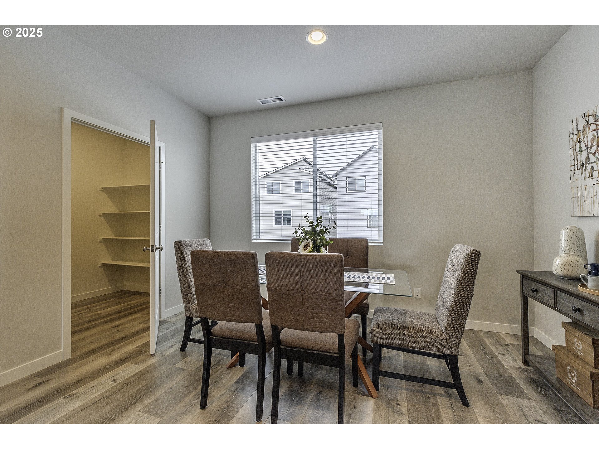 2129 Colby Lane, Unit 75 Forest Grove, OR 97116 - Photo 20 of 33 a view of a dining room with furniture and wooden floor