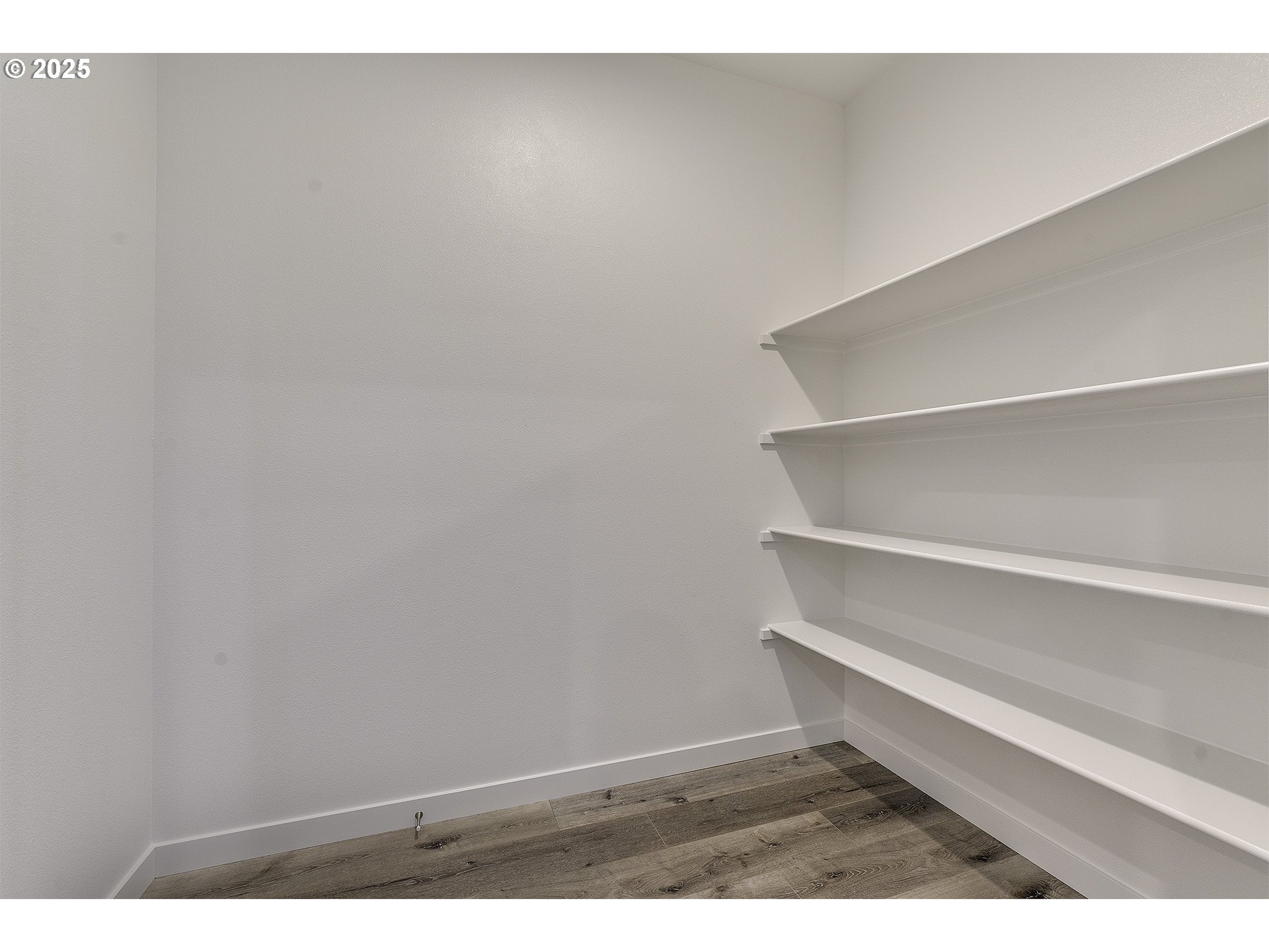 2129 Colby Lane, Unit 75 Forest Grove, OR 97116 - Photo 21 of 33 a view of a room with racks on the wall