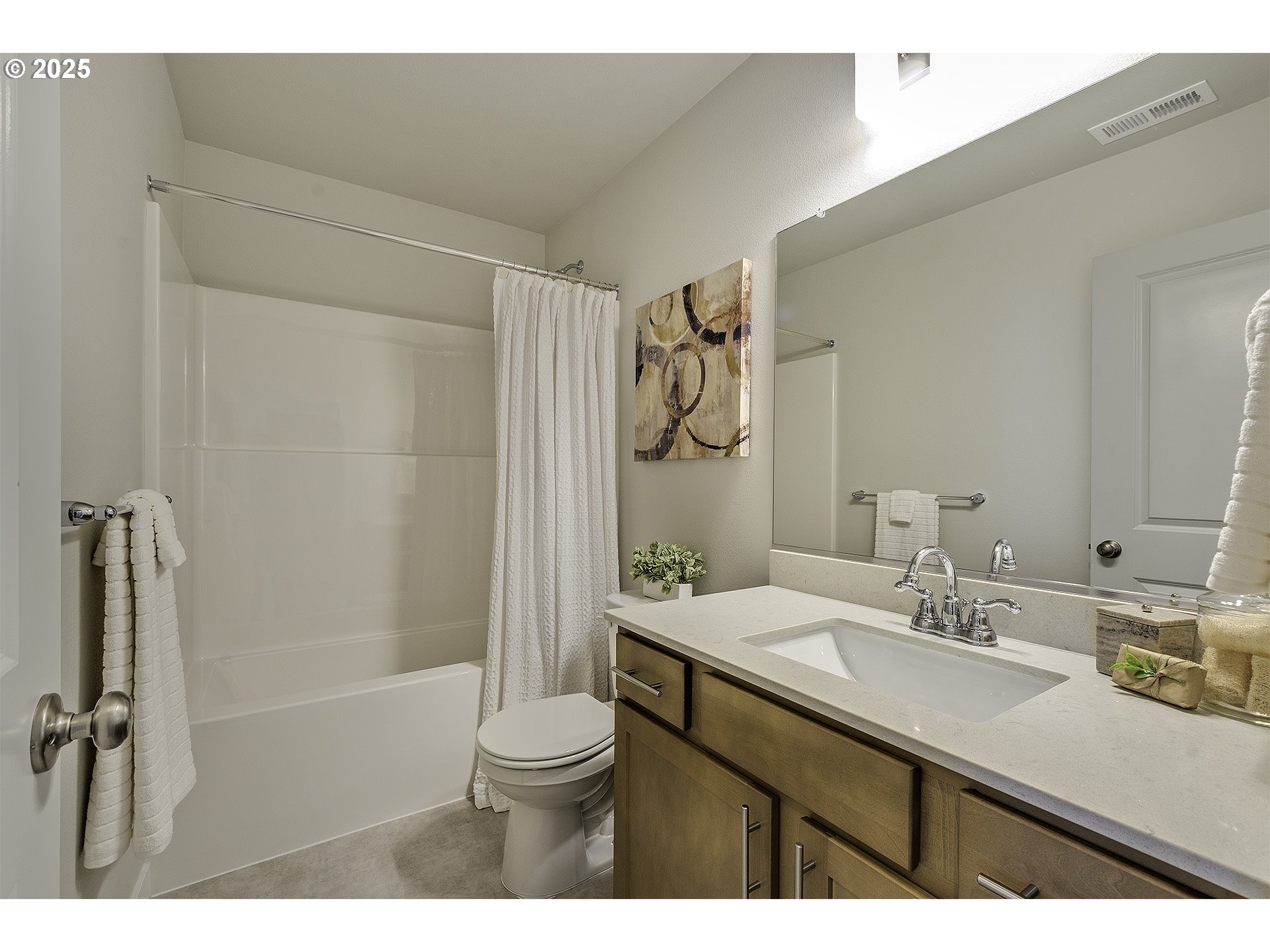 2129 Colby Lane, Unit 75 Forest Grove, OR 97116 - Photo 31 of 33 a bathroom with a sink a toilet a mirror and shower