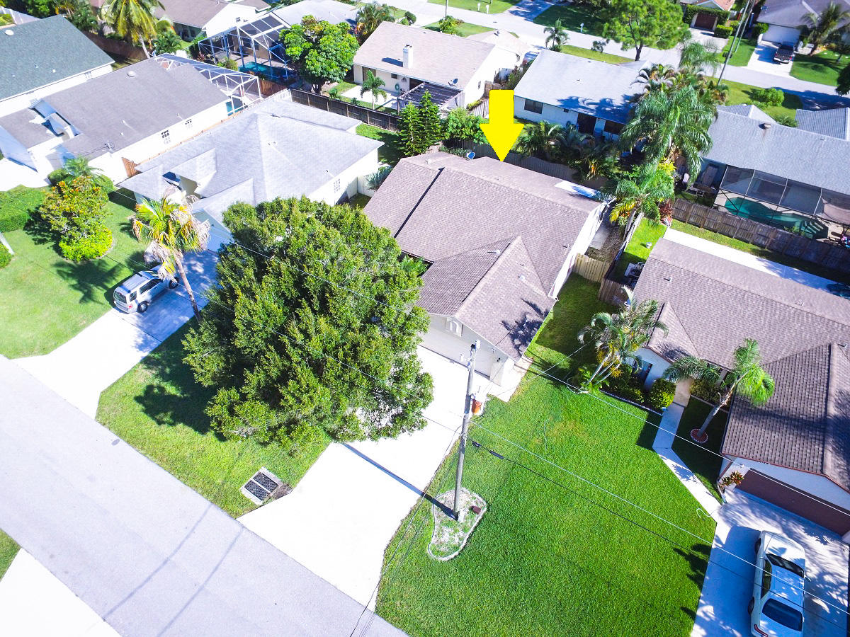 6083 Ungerer Street Jupiter, FL 33458 - Photo 2 of 26 DJI_0017_edited