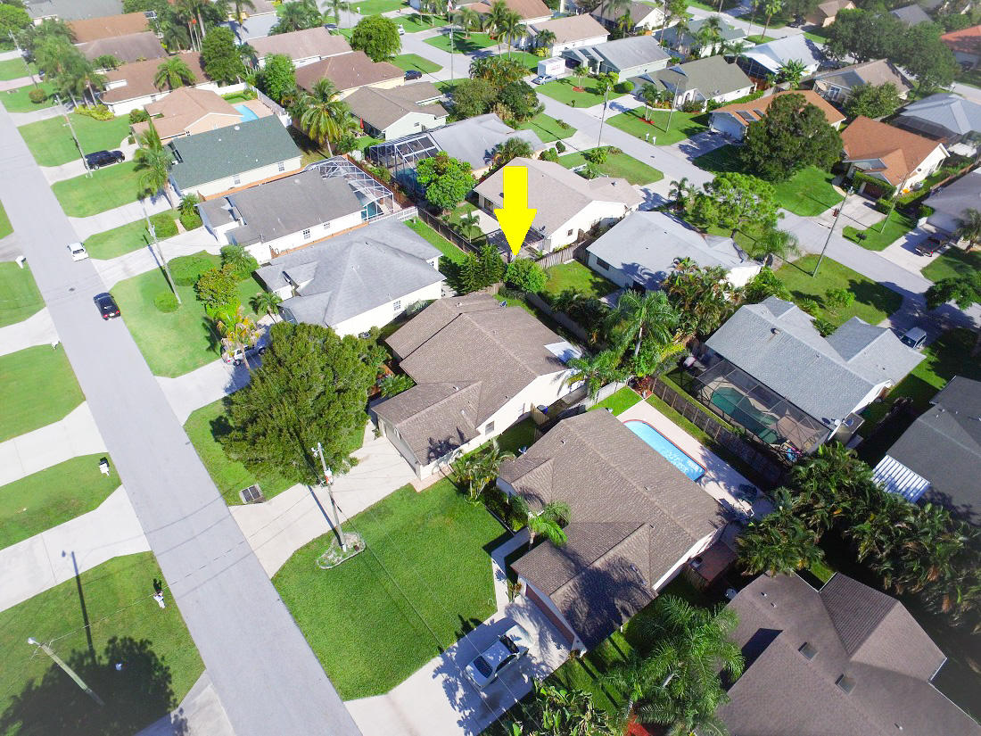 6083 Ungerer Street Jupiter, FL 33458 - Photo 3 of 26 DJI_0023_edited