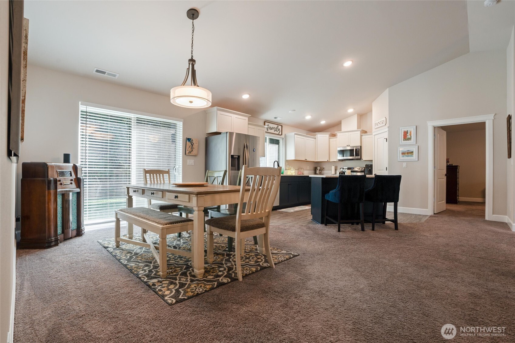 21356 Jefferson Beach Road Northeast Kingston, WA 98346 - Photo 11 of 40 a dining room with furniture and window