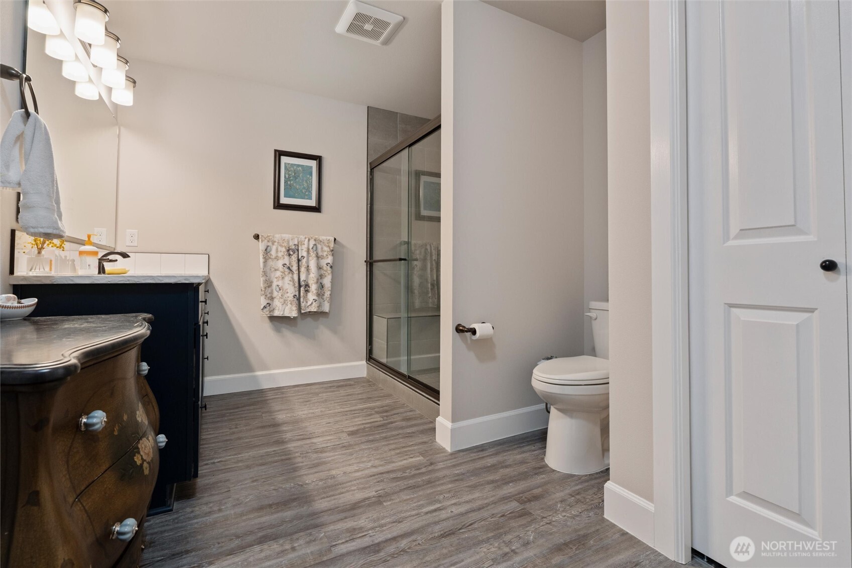 21356 Jefferson Beach Road Northeast Kingston, WA 98346 - Photo 20 of 40 a bathroom with a sink toilet and shower