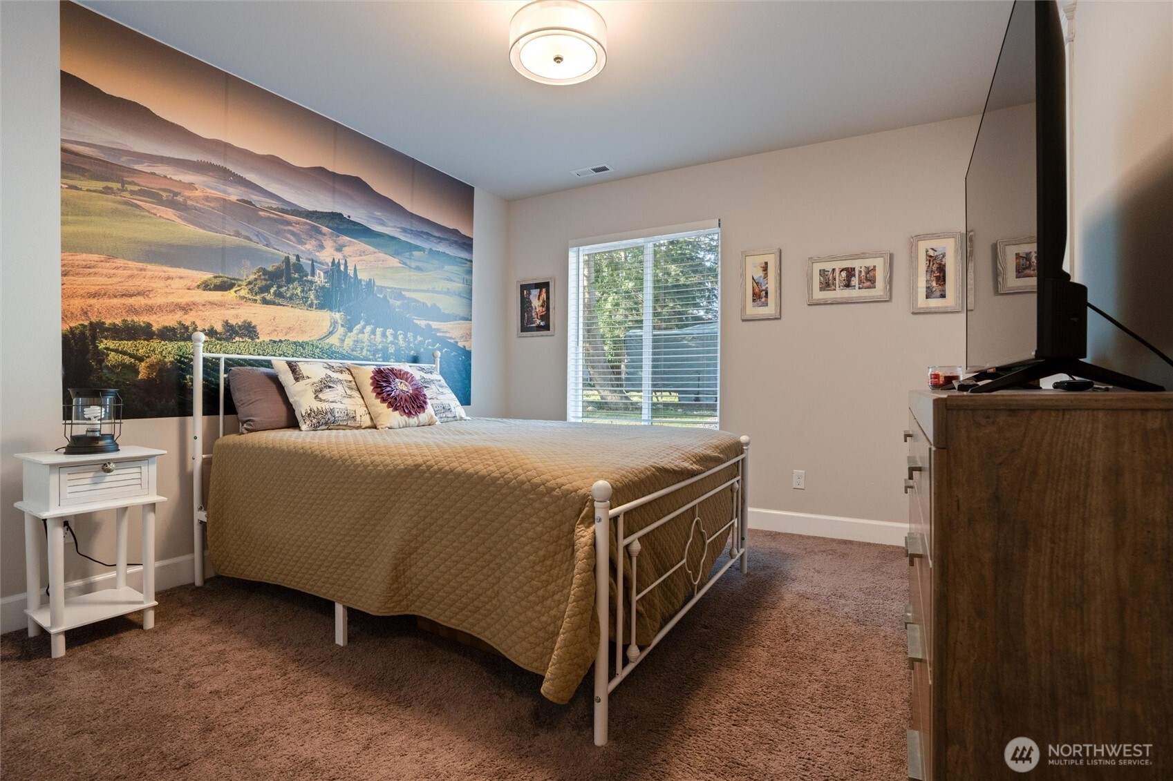 21356 Jefferson Beach Road Northeast Kingston, WA 98346 - Photo 23 of 40 a bed sitting in a room next to a window