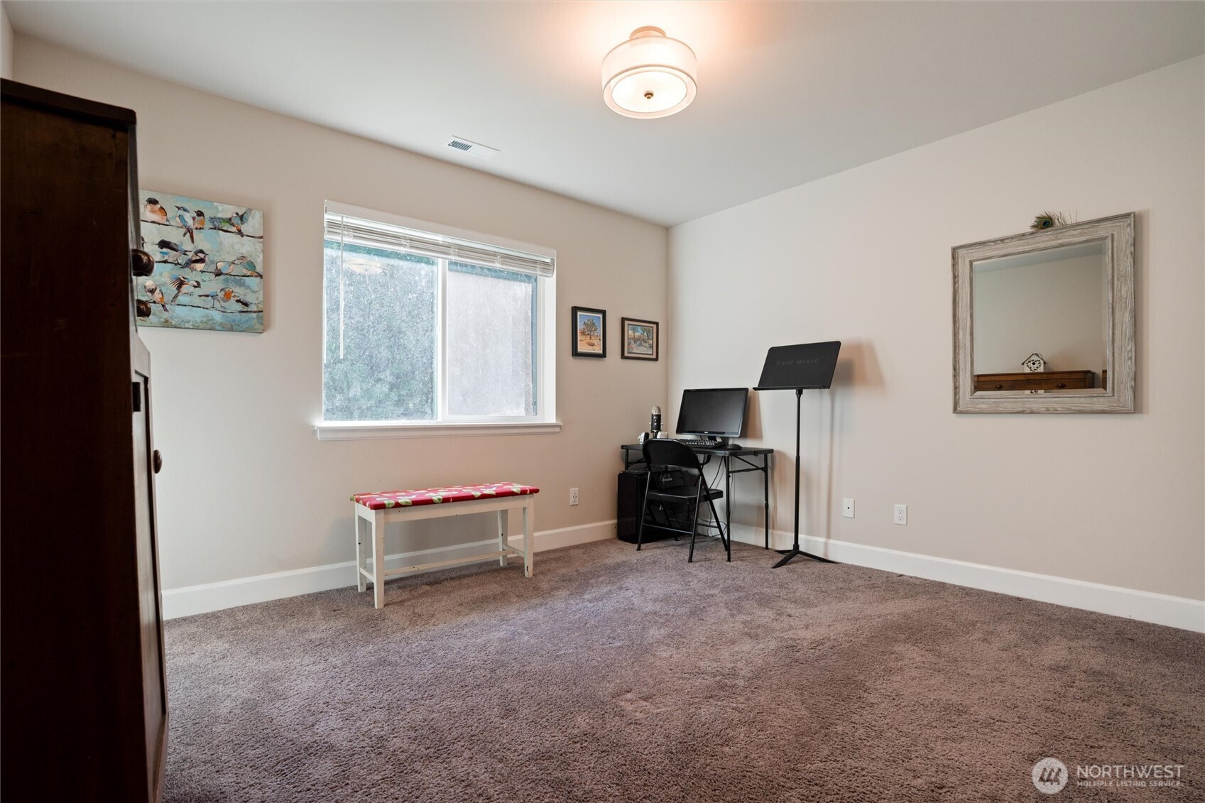 21356 Jefferson Beach Road Northeast Kingston, WA 98346 - Photo 24 of 40 a living room with furniture and a window