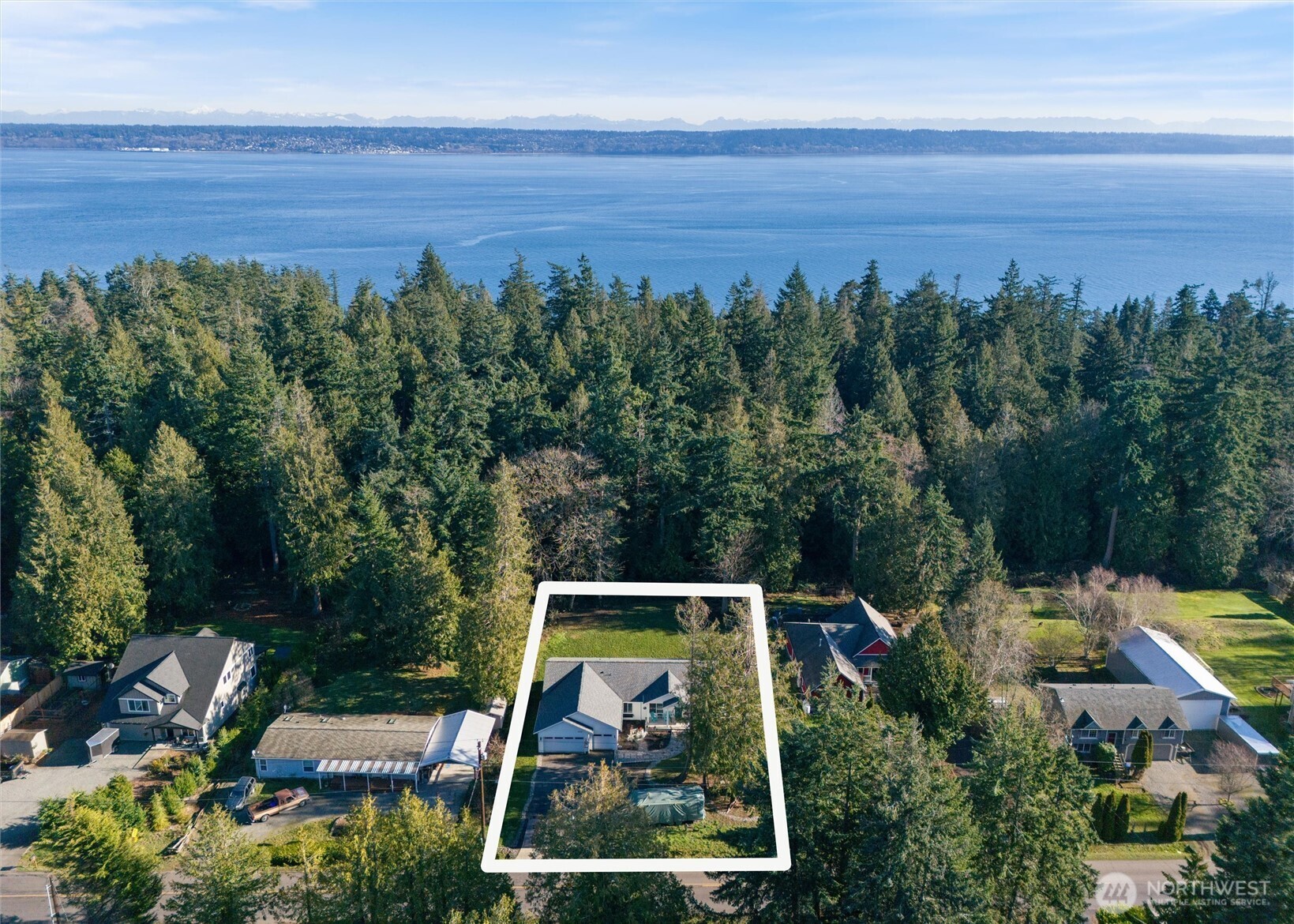 21356 Jefferson Beach Road Northeast Kingston, WA 98346 - Photo 33 of 40 an aerial view of a house with garden space and outdoor space