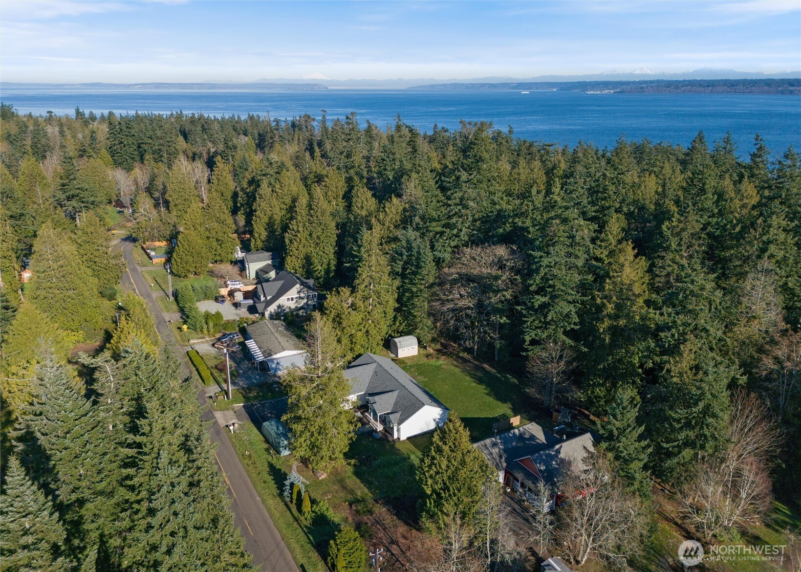 21356 Jefferson Beach Road Northeast Kingston, WA 98346 - Photo 39 of 40 an aerial view of residential house with outdoor space and trees all around