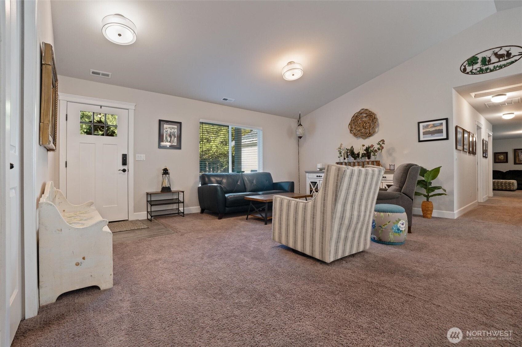 21356 Jefferson Beach Road Northeast Kingston, WA 98346 - Photo 6 of 40 a living room with furniture and a window