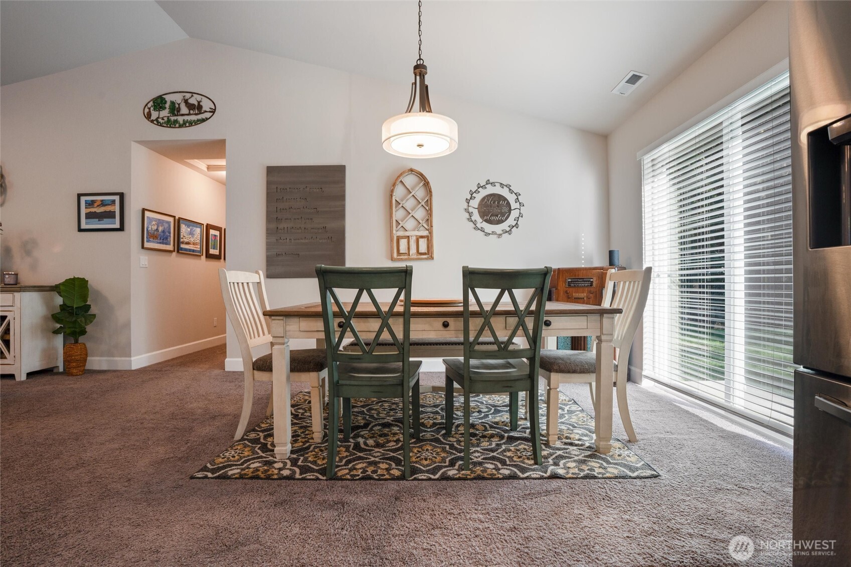 21356 Jefferson Beach Road Northeast Kingston, WA 98346 - Photo 9 of 40 a dining room with furniture and window