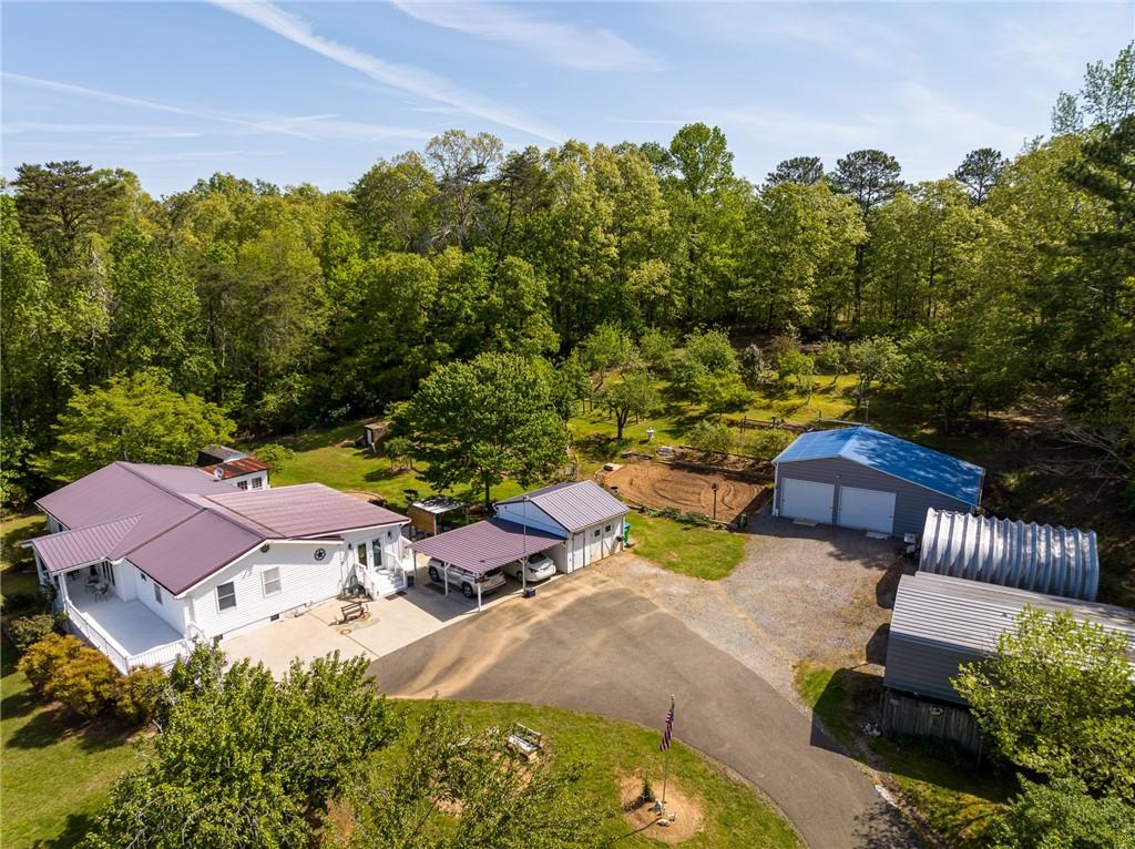 1387 Bryant Road Ranger, GA 30734 - Photo 1 of 1 an aerial view of a house with garden space and street view