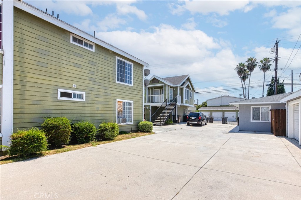 320 West Truslow Avenue, Unit D Fullerton, CA 92832 - Photo 3 of 25 a view of a house with many windows