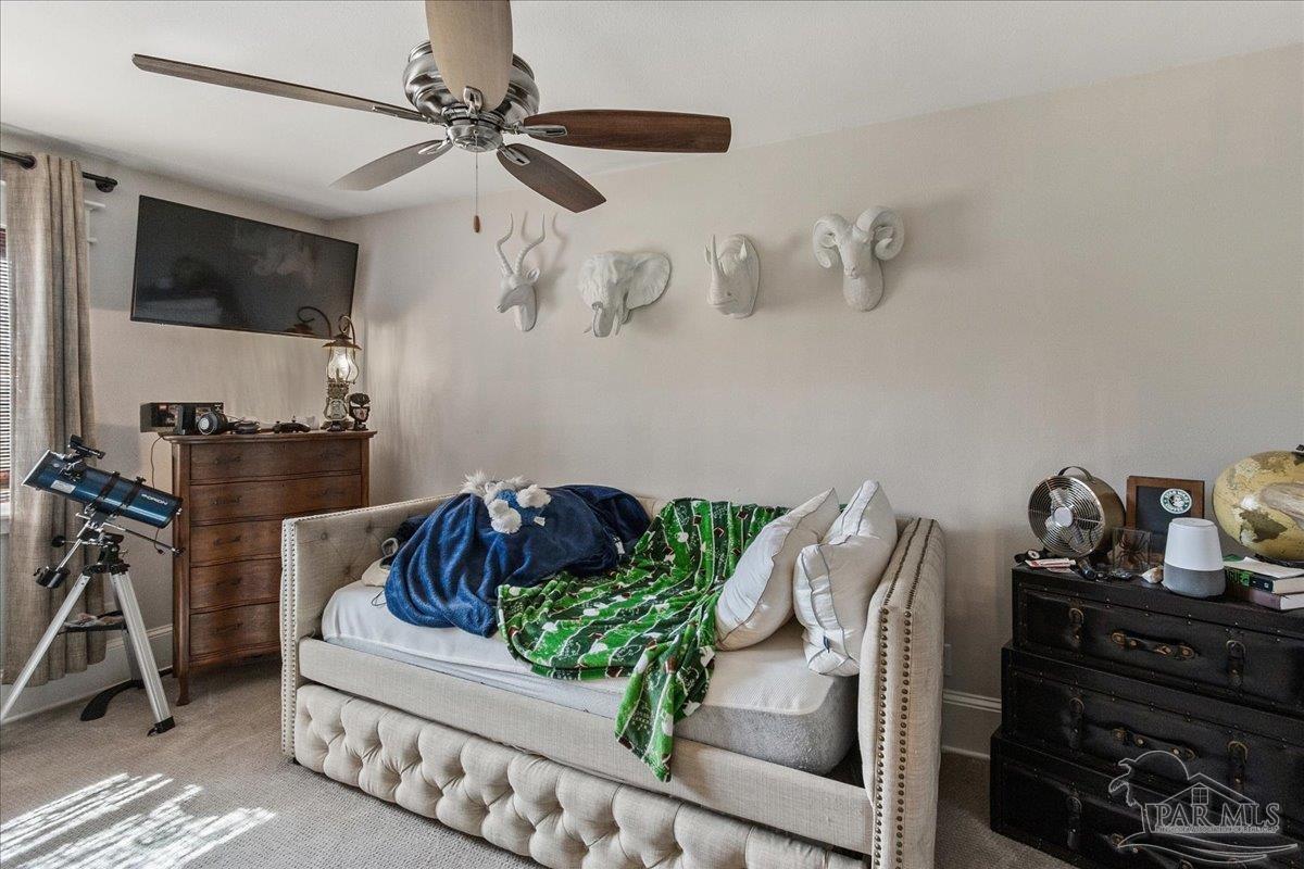 9050 Salter Road Pace, FL 32571 - Photo 30 of 48 a room with storage and utility