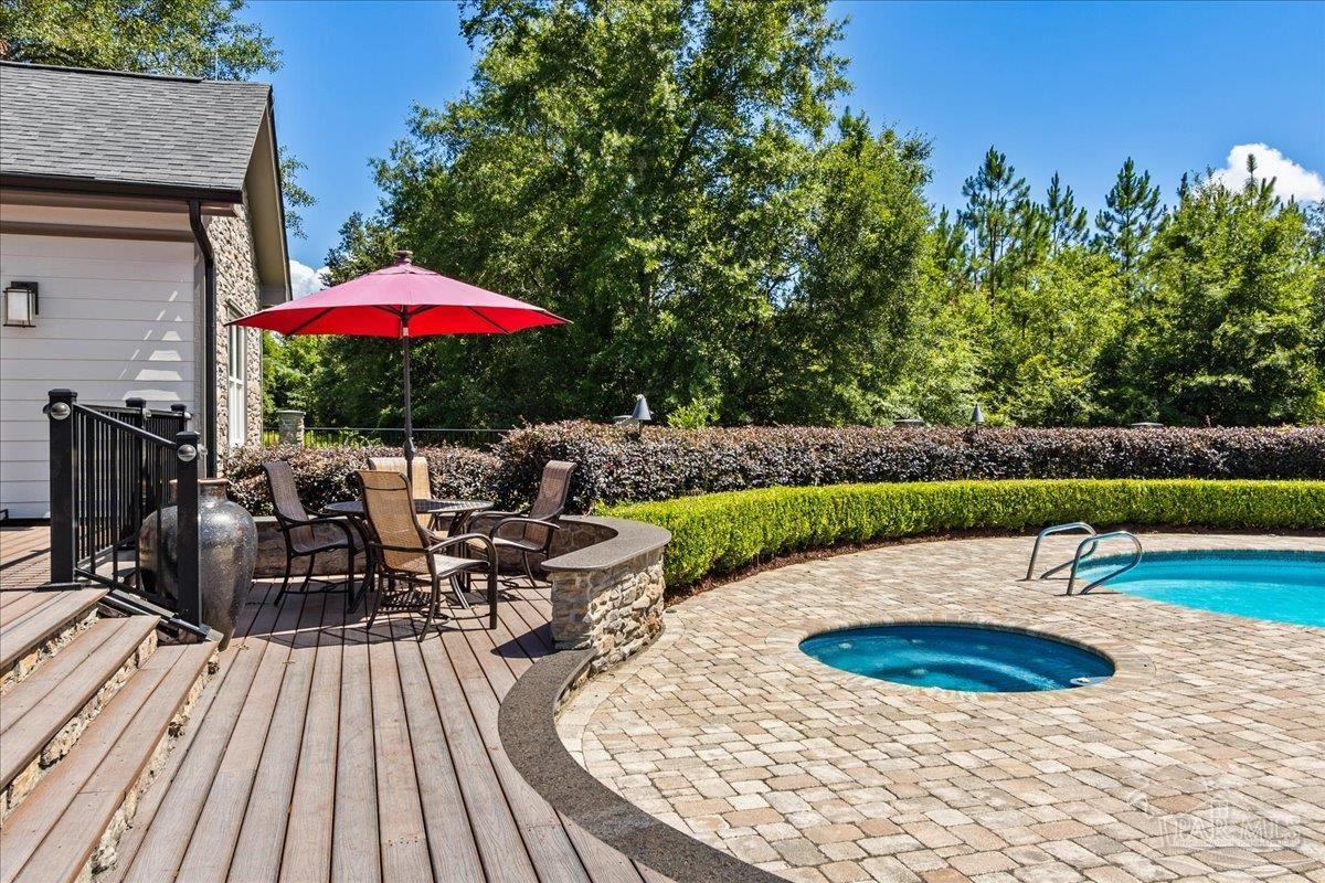 9050 Salter Road Pace, FL 32571 - Photo 39 of 48 an outdoor space with seating